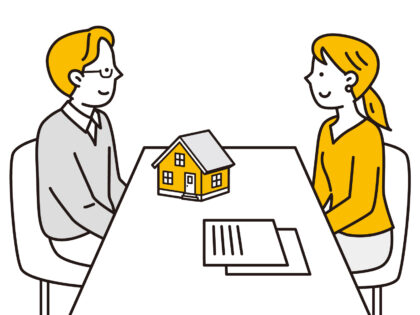 住宅の購入について相談する夫婦